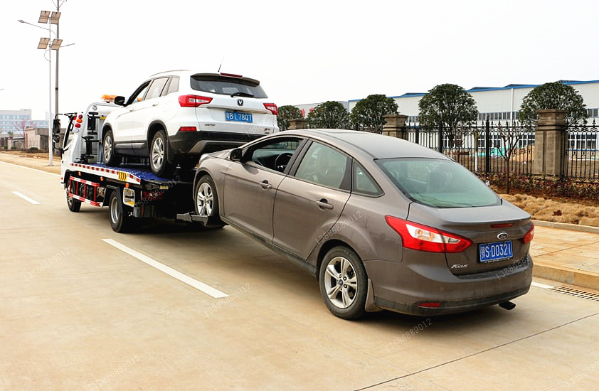 一拖二平板清障車拖2個(gè)車圖片
